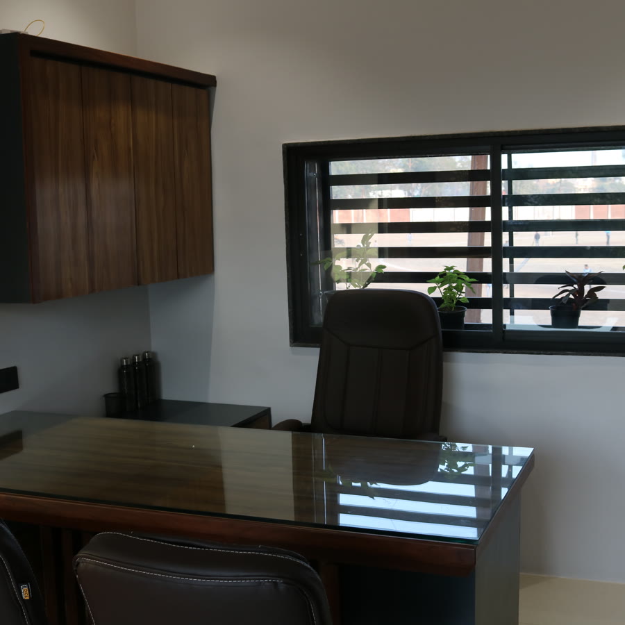 Creative Spaces studio interior — desk with a window view